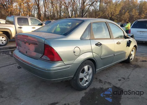 2003 Ford Focus Se z USA, uszkodzony, nr VIN 1FAFP34353W311314